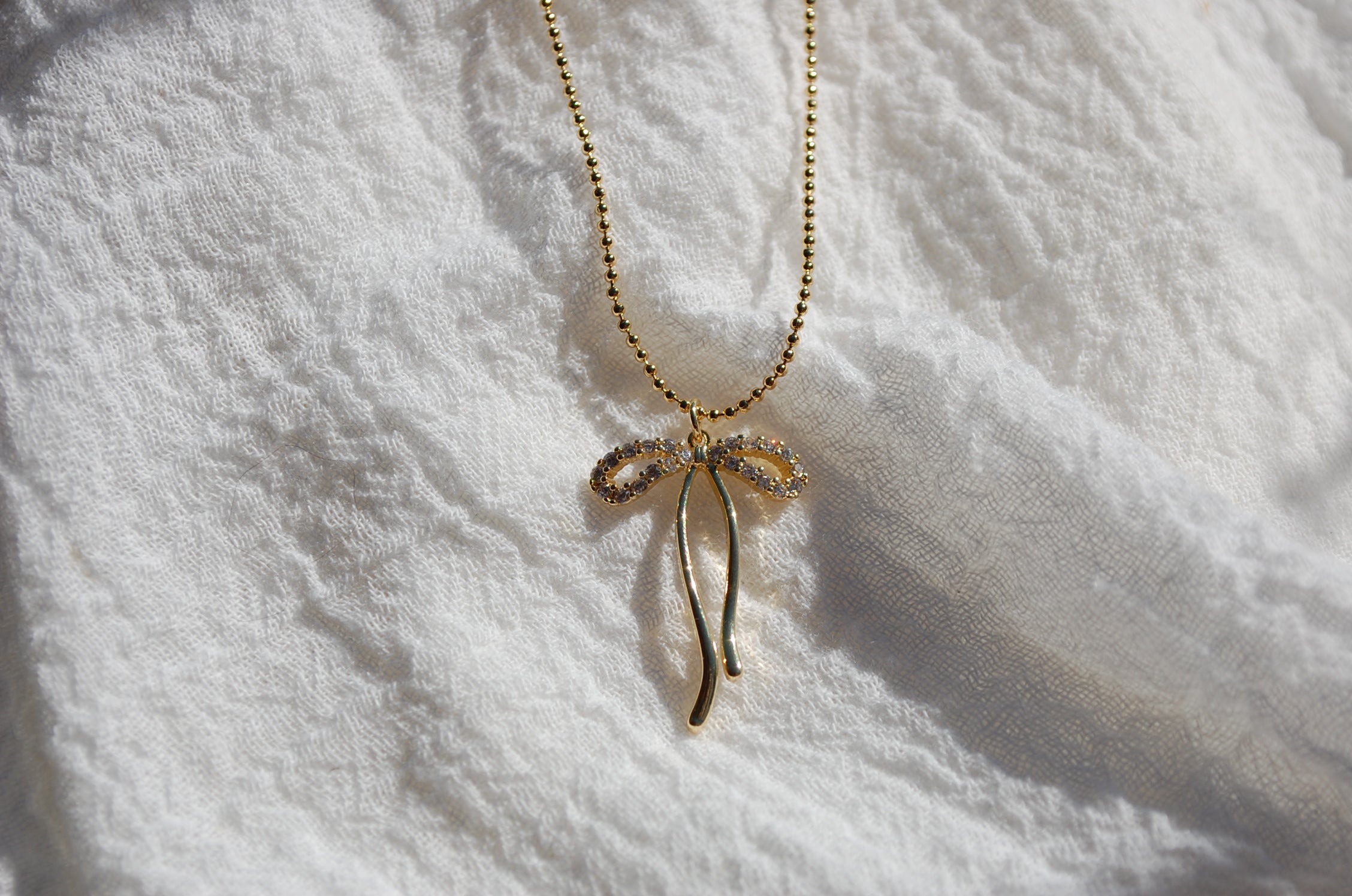 a little sparkle ribbon necklace